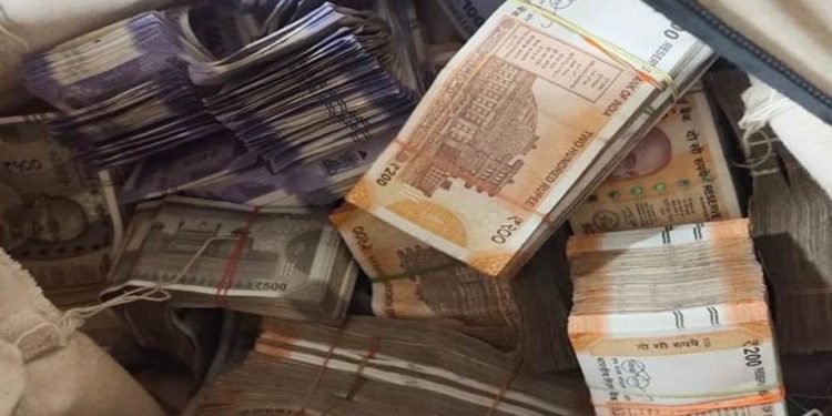 Cash Seized from Businessmen's Hideout